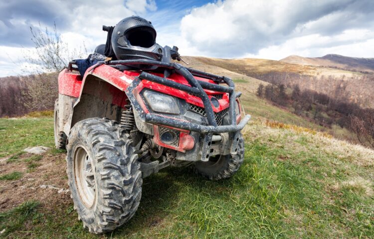 An ATV with a helmet shows the importance of ATV safety