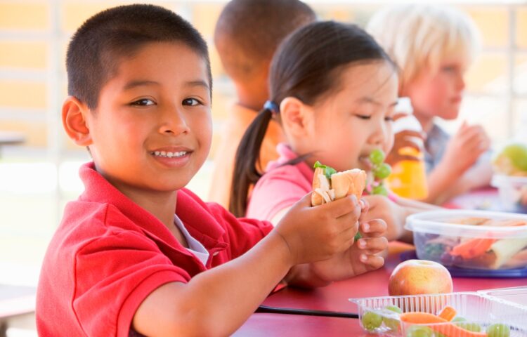 children eating healthy school lunches