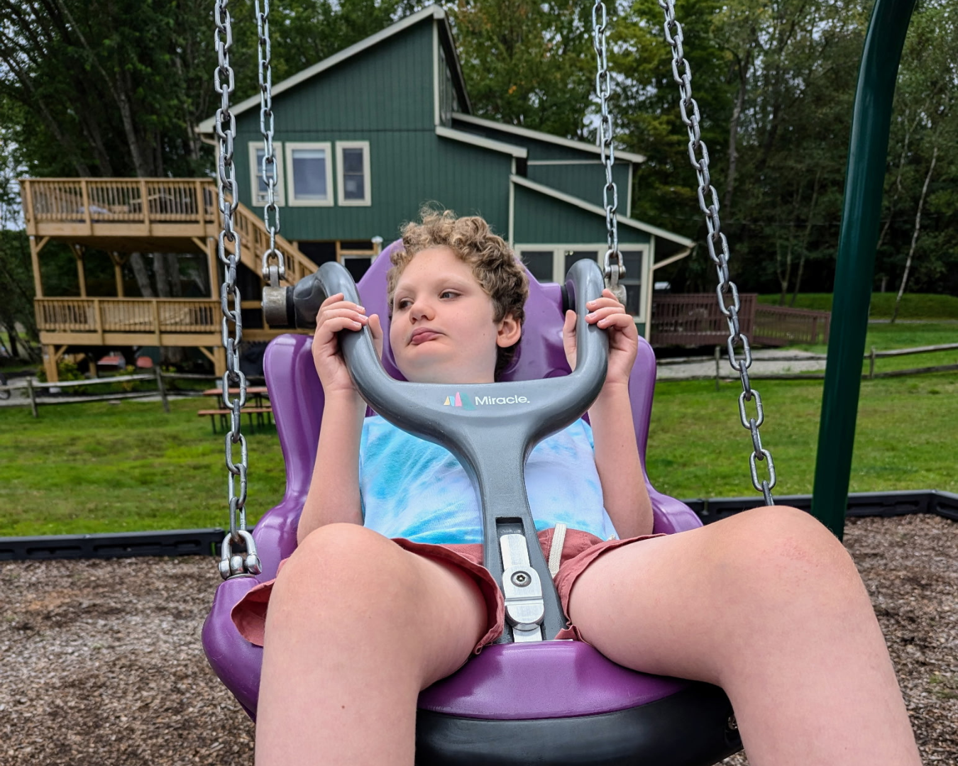 Boy diagnosed with unbalanced translocation in adaptive playground swing 