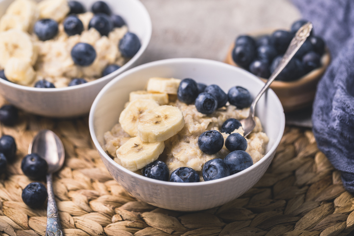 Image of a Blueberry Banana Oat Breakfast Bowl which is a low FODMAP recipe.